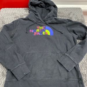 The North face long sleeve hoodie size medium Black multicolor logo